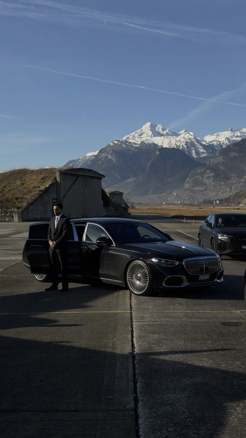 Private chauffeur from Geneva to Courchevel, luxury car in the snowy Alps