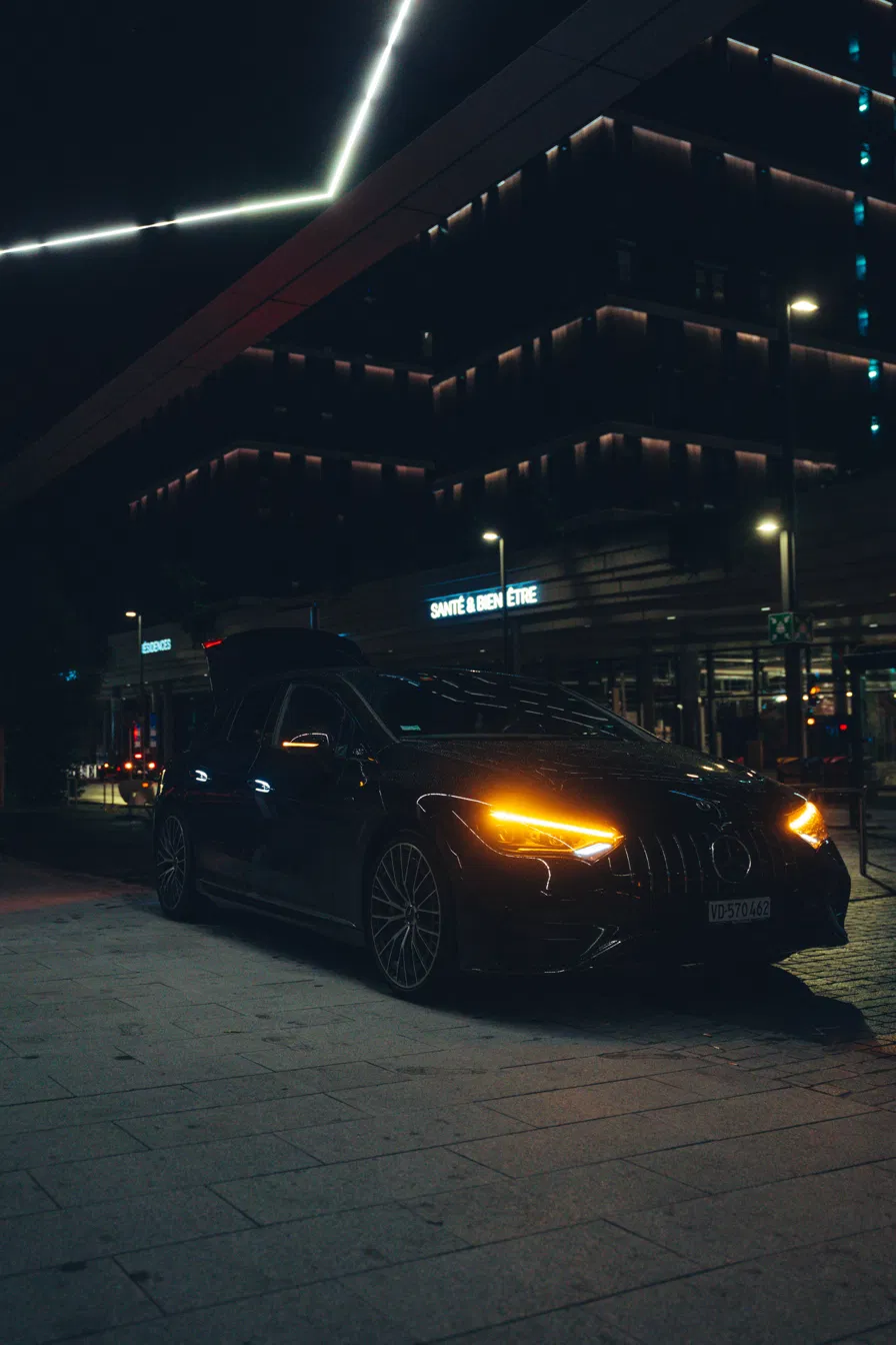 Private chauffeur from Geneva to Zurich, luxury Mercedes at night